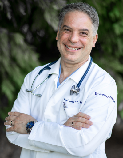 Dr Raul Garcia portrait white doctor coat